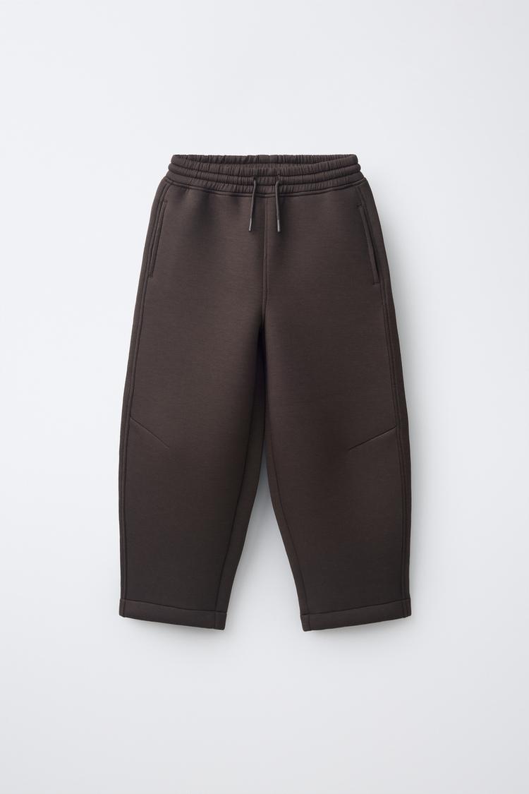 NEOPRENE EFFECT BARREL PANTS — Brown