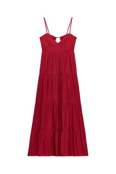 "Front view of a raspberry long dress with a V-neckline, adjustable spaghetti straps, and tonal entredeux detailing."