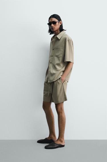 FADED-EFFECT RELAXED FIT BERMUDA SHORTS - Beige by Zara