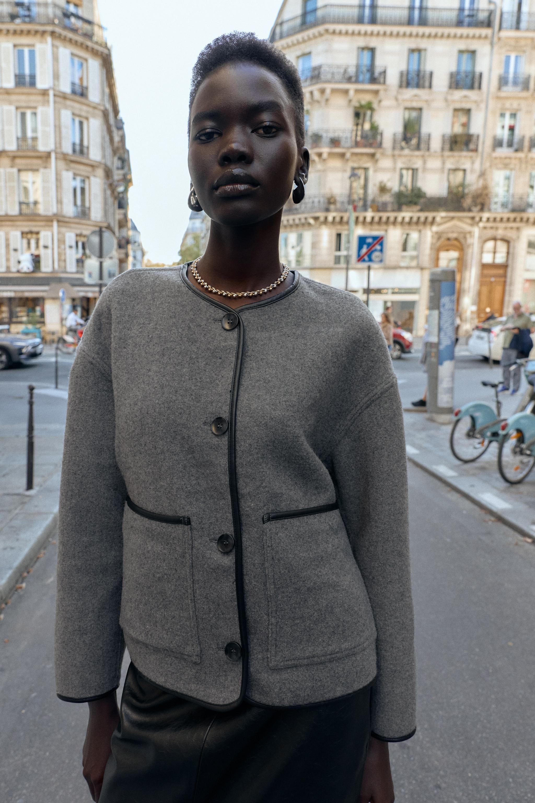 VESTE RÉVERSIBLE À LISERÉS EN MATIÈRE SYNTHÉTIQUE