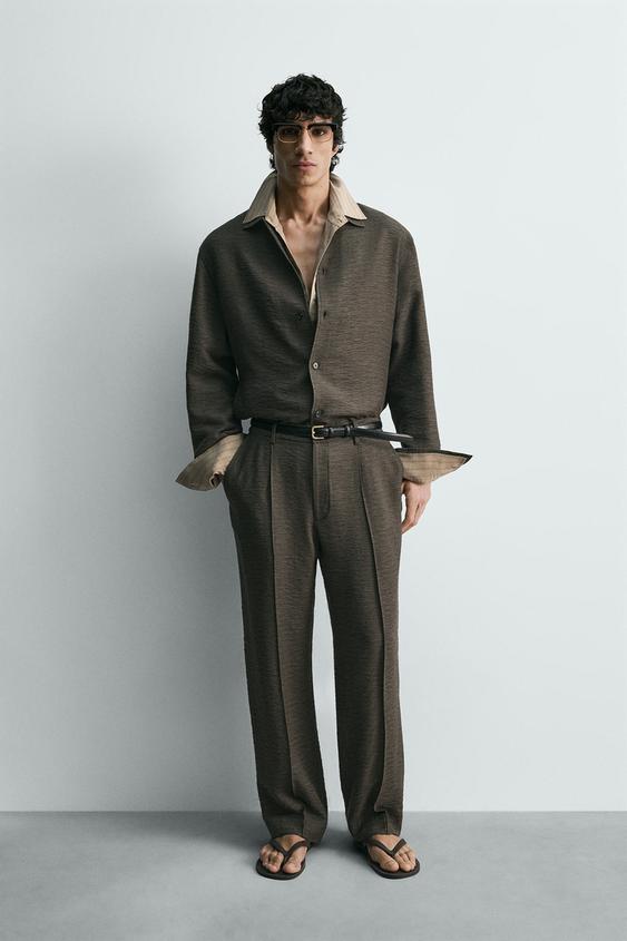 FLOWY TEXTURED PLEATED PANTS