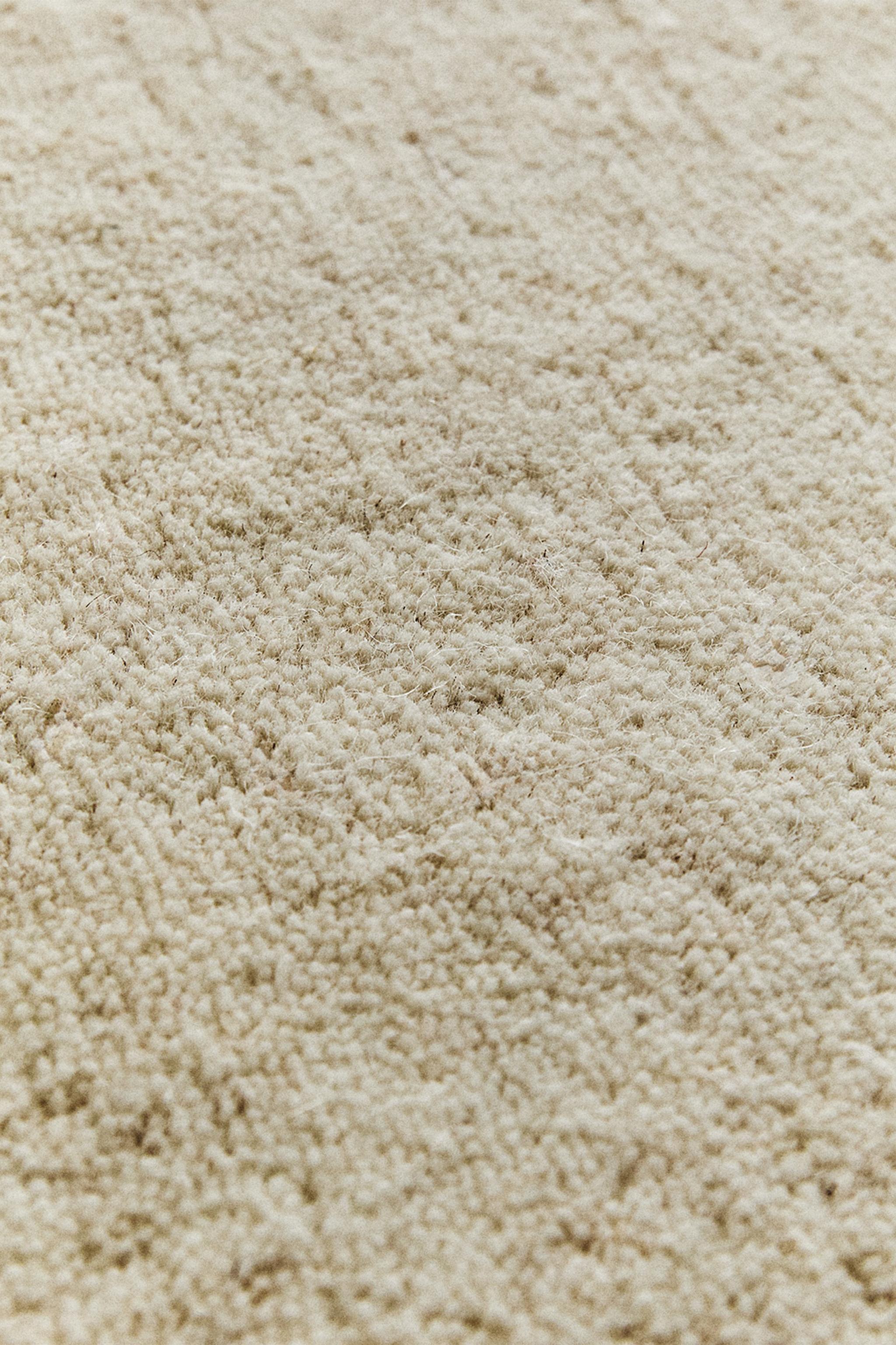 SOLID WOOL RUG