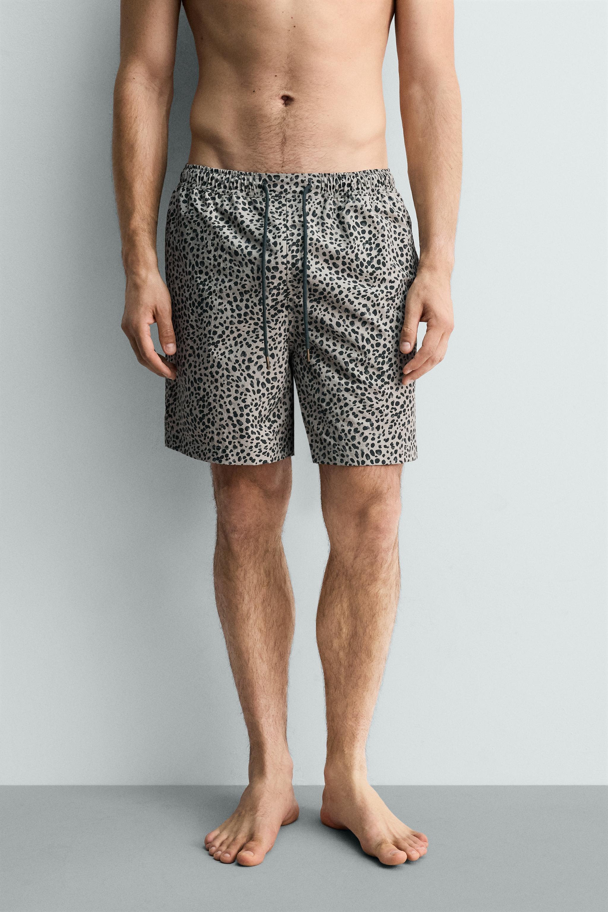 ANIMAL PRINT LONG SWIM TRUNKS