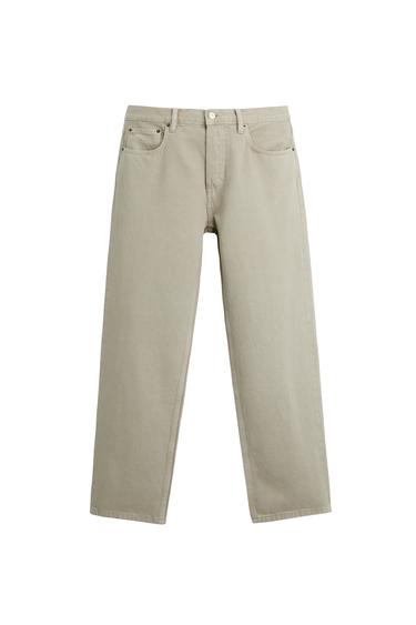 Front view of beige trousers with side pockets and front button fastening.