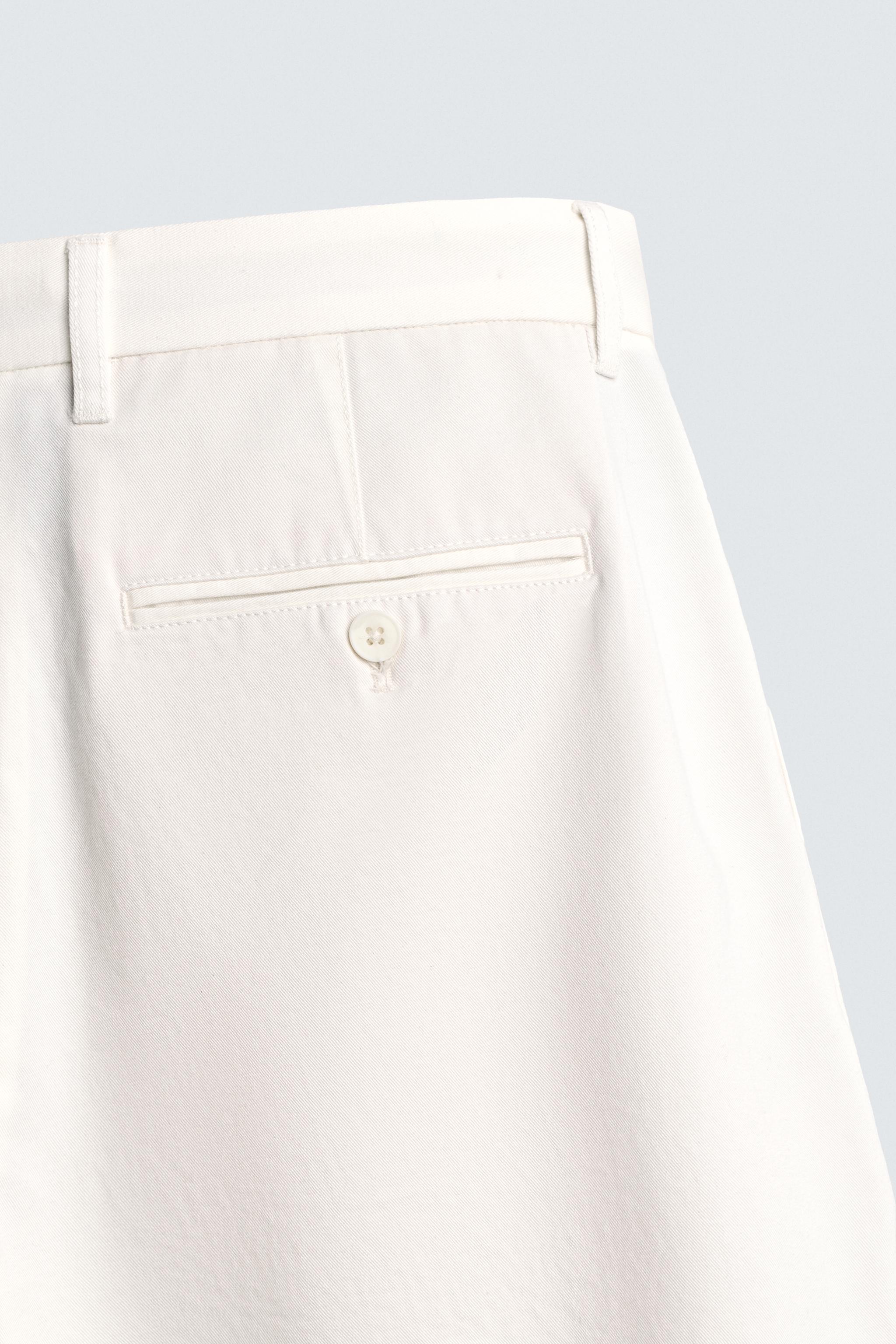 BERMUDA RELAXED FIT À PLIS