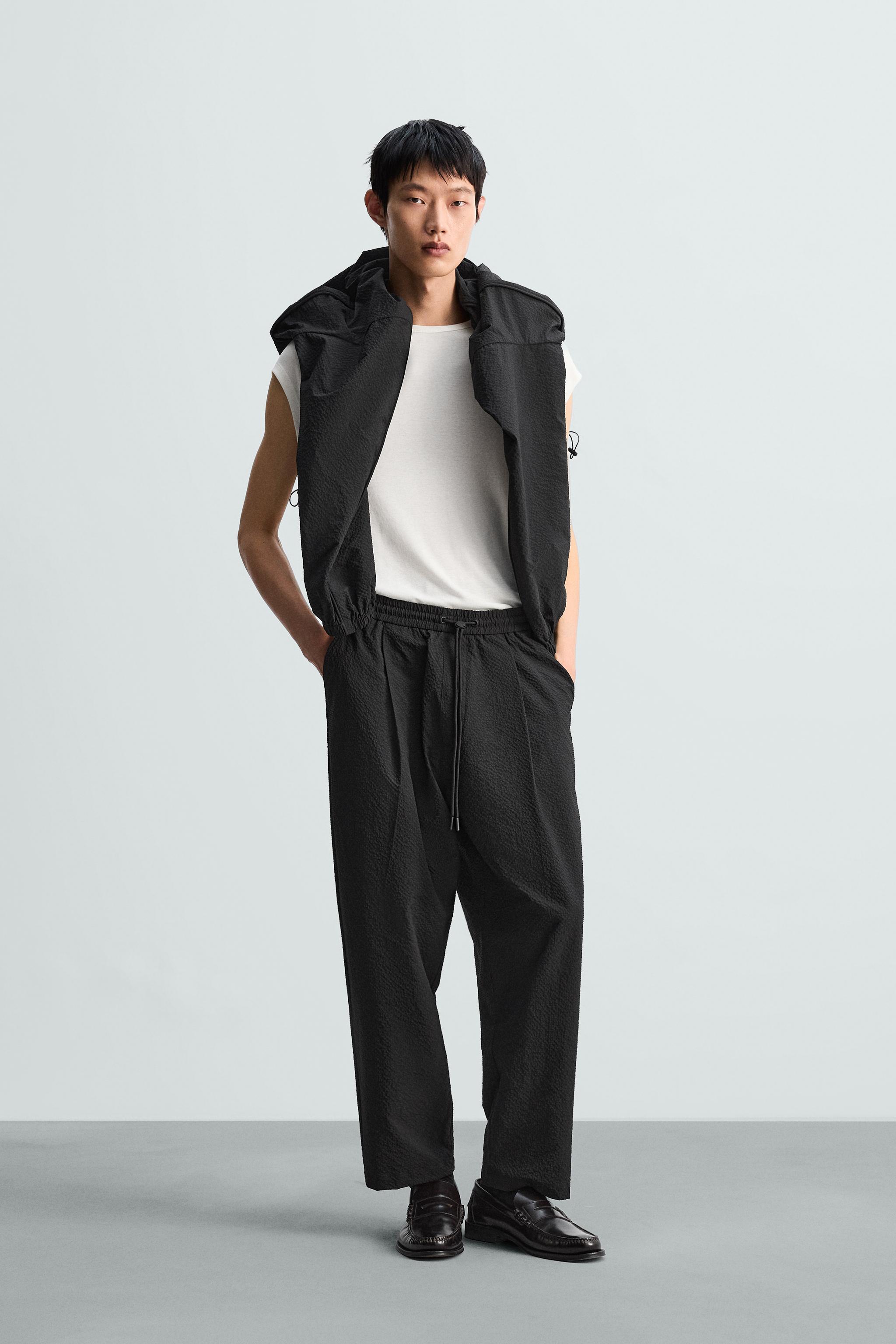 CALÇA RELAXED FIT SEERSUCKER - Preto | ZARA Brasil