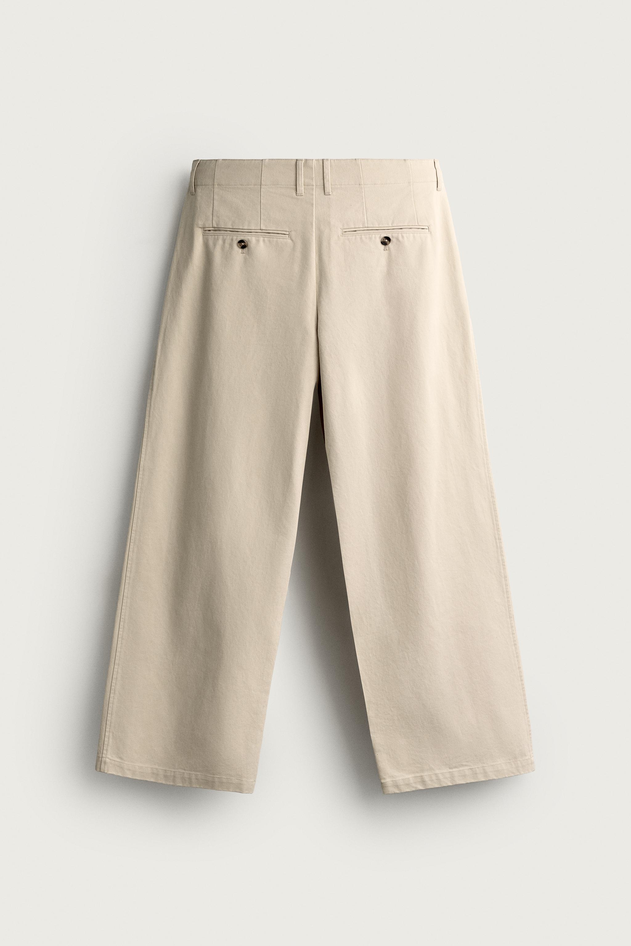 RELAXED FIT PLEATED PANTS