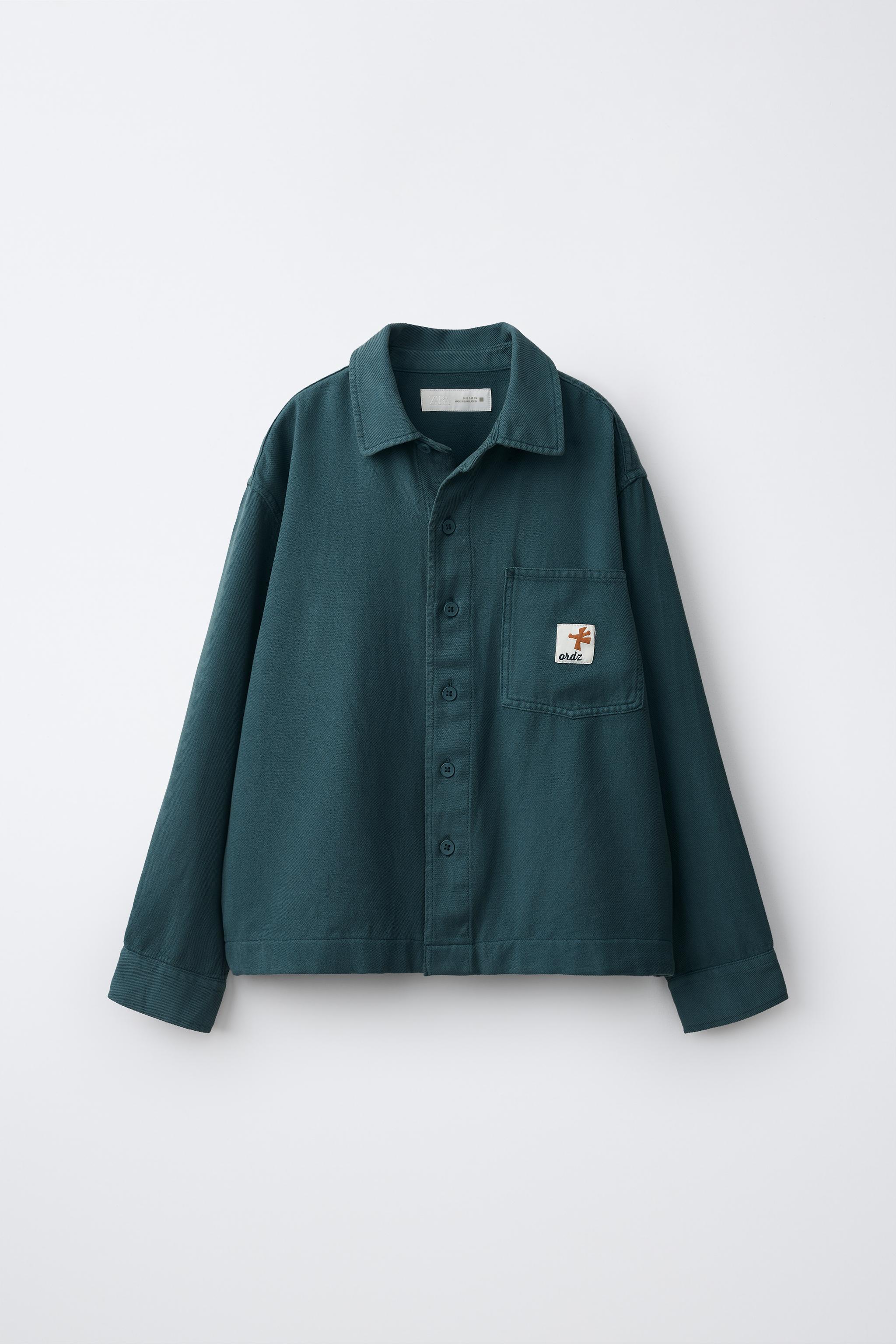 SOBRECAMISA BOLSILLO ETIQUETA