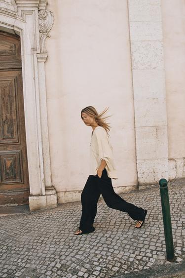 PANTALÓN FLUIDO ANCHO - Negro de Zara