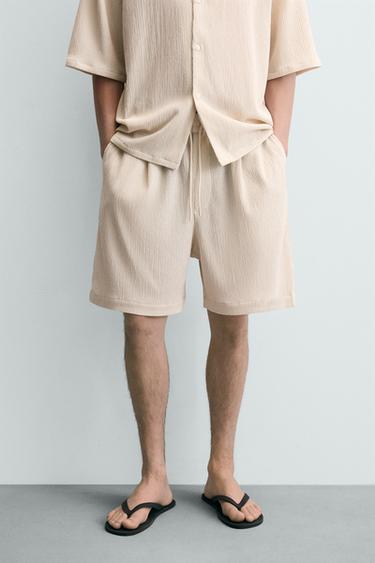 BERMUDY RELAX FIT S RELIÉFOM - Béžová zemitá zn. Zara