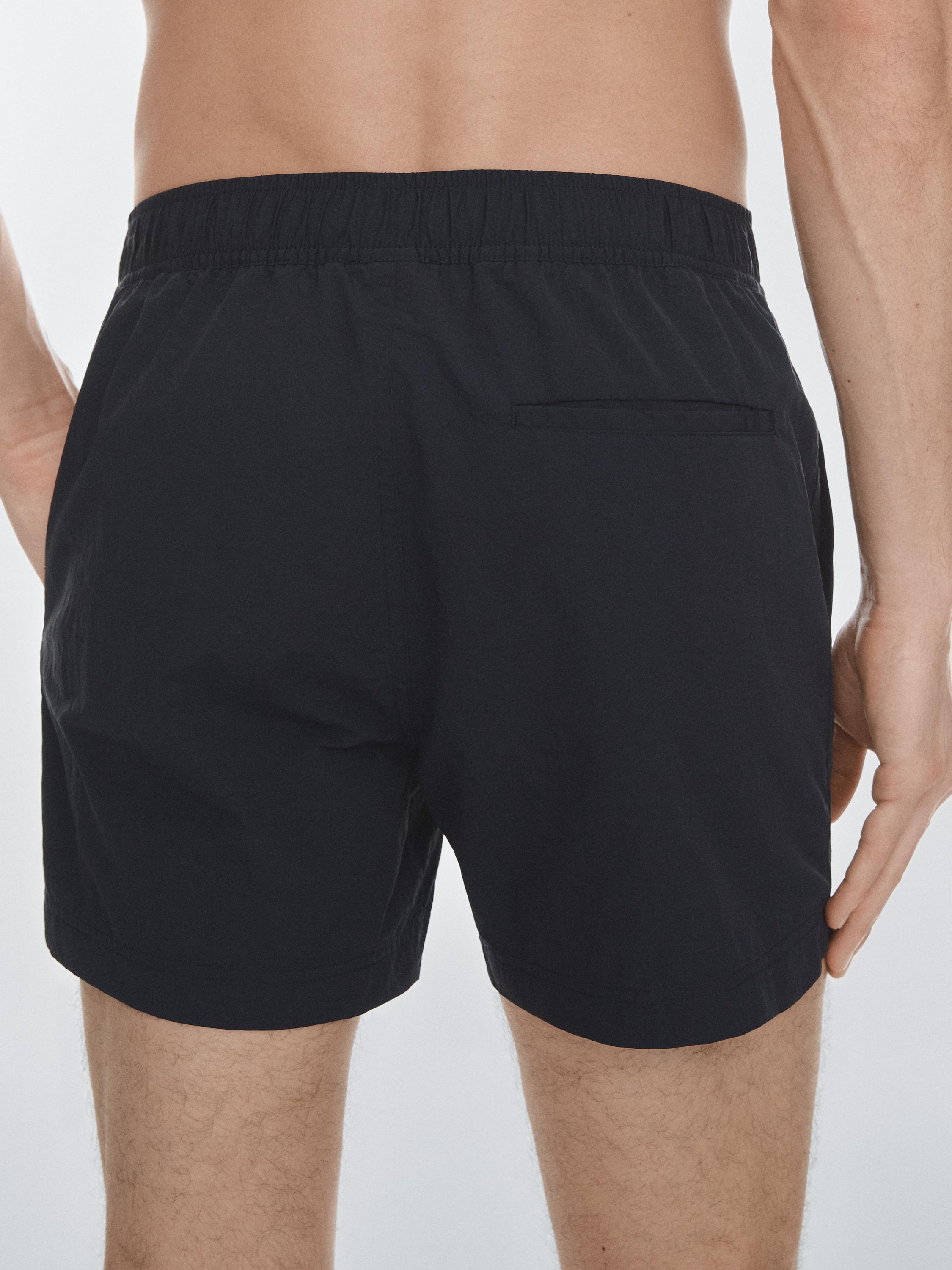 Maillot de bain uni détail taille