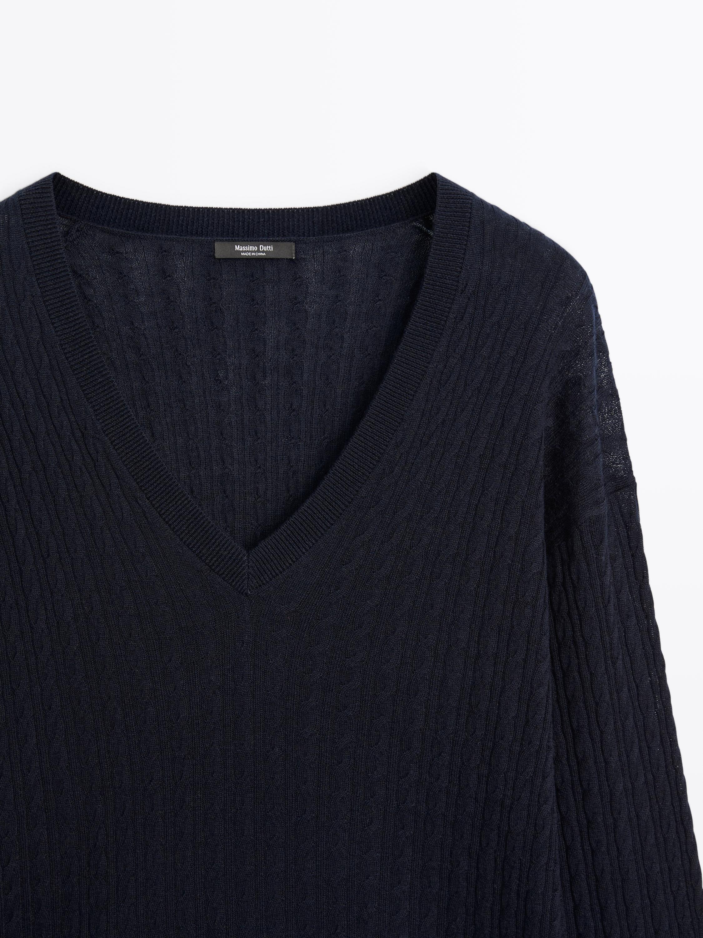 V-neck cable-knit sweater