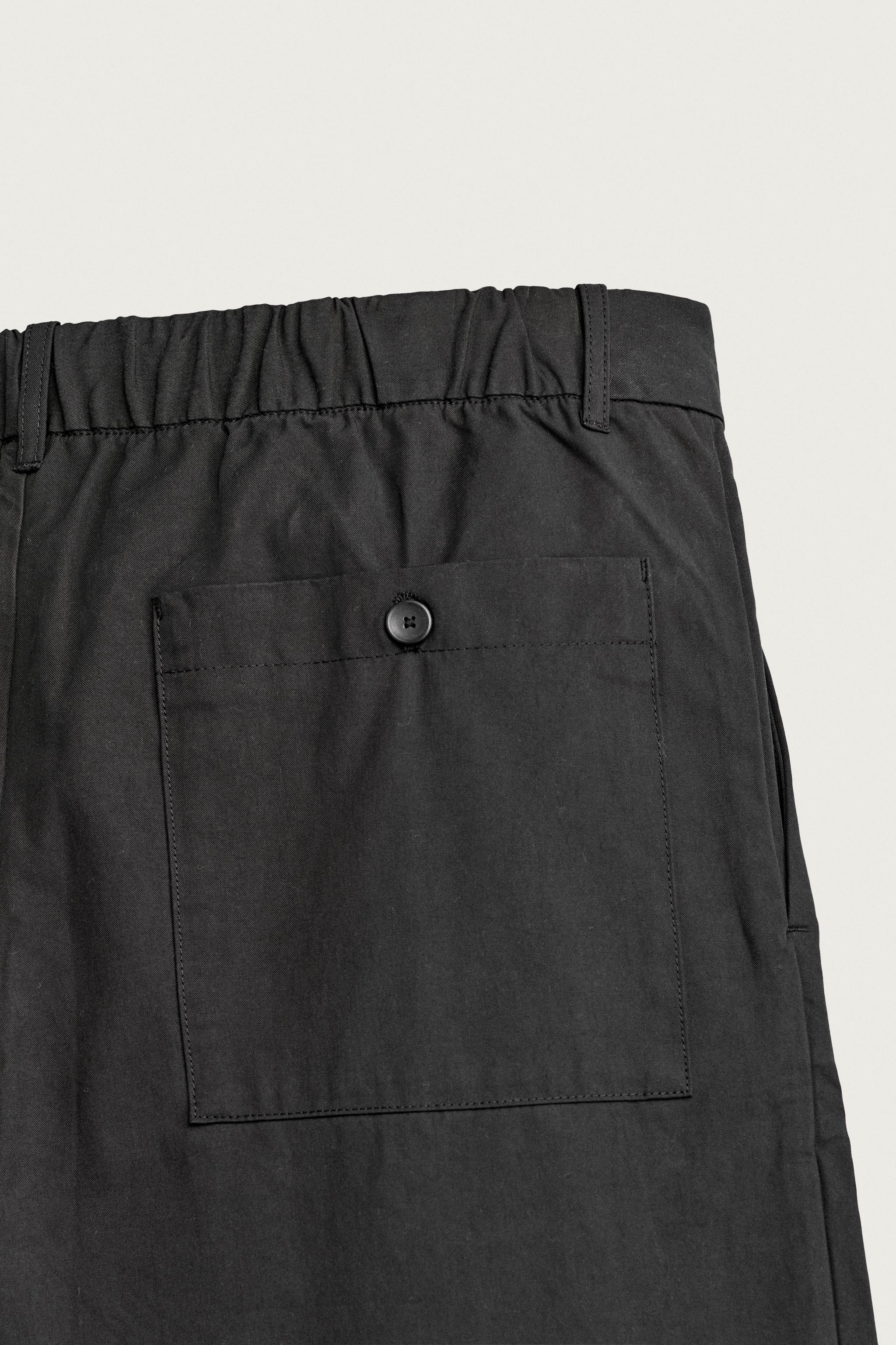 STRAIGHT-FIT PANTS WITH SIDE PLEATS