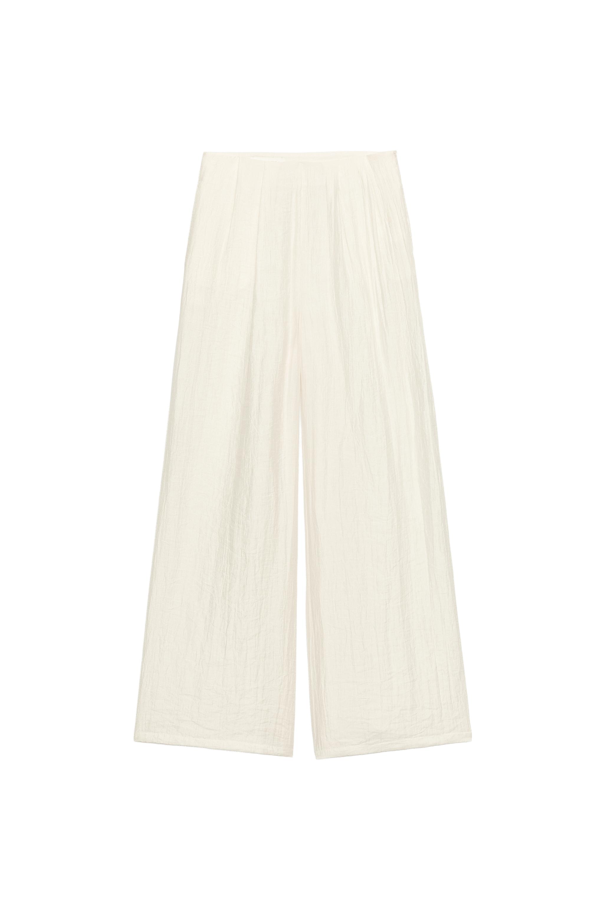 PANTALÓN ANCHO PLIEGUES