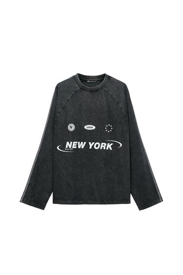 WASHED EFFECT T-SHIRT WITH SLOGAN