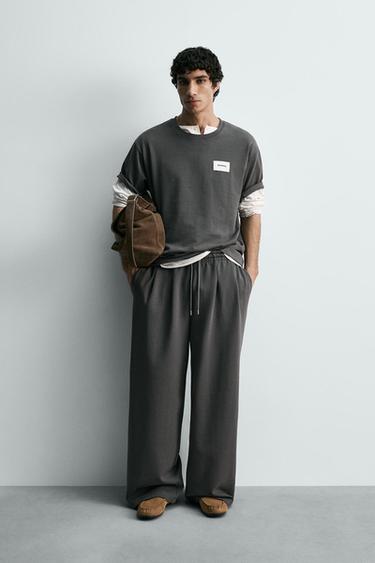 تيشرت برقعة وتسمية - رمادي داكن الخاص بـ Zara - صورة 0