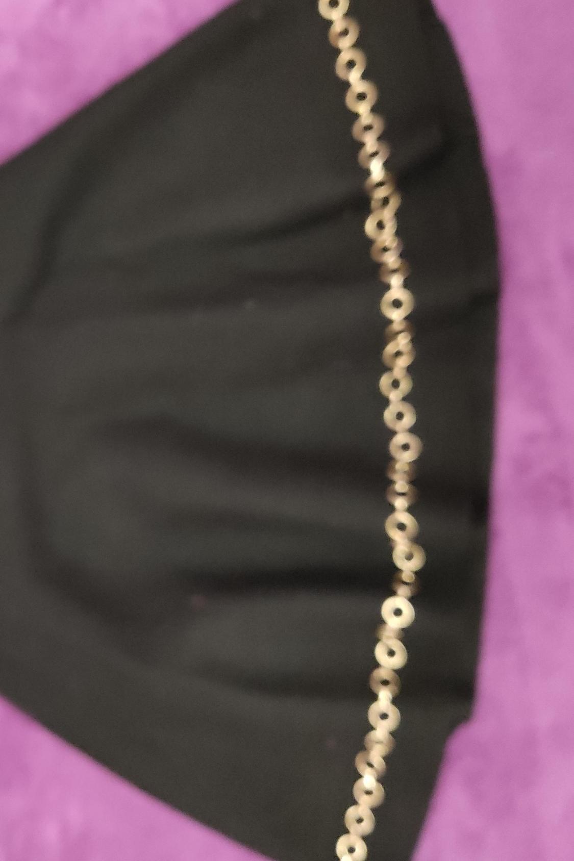MINI SKIRT WITH CHAIN DETAIL