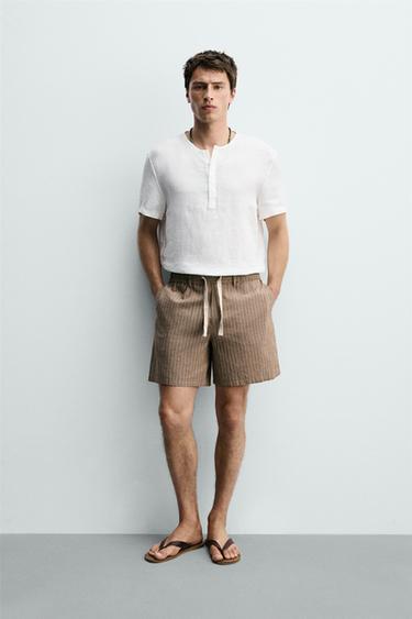 برمودا RELAXED FIT قطن - كتان - بني / خام الخاص بـ Zara