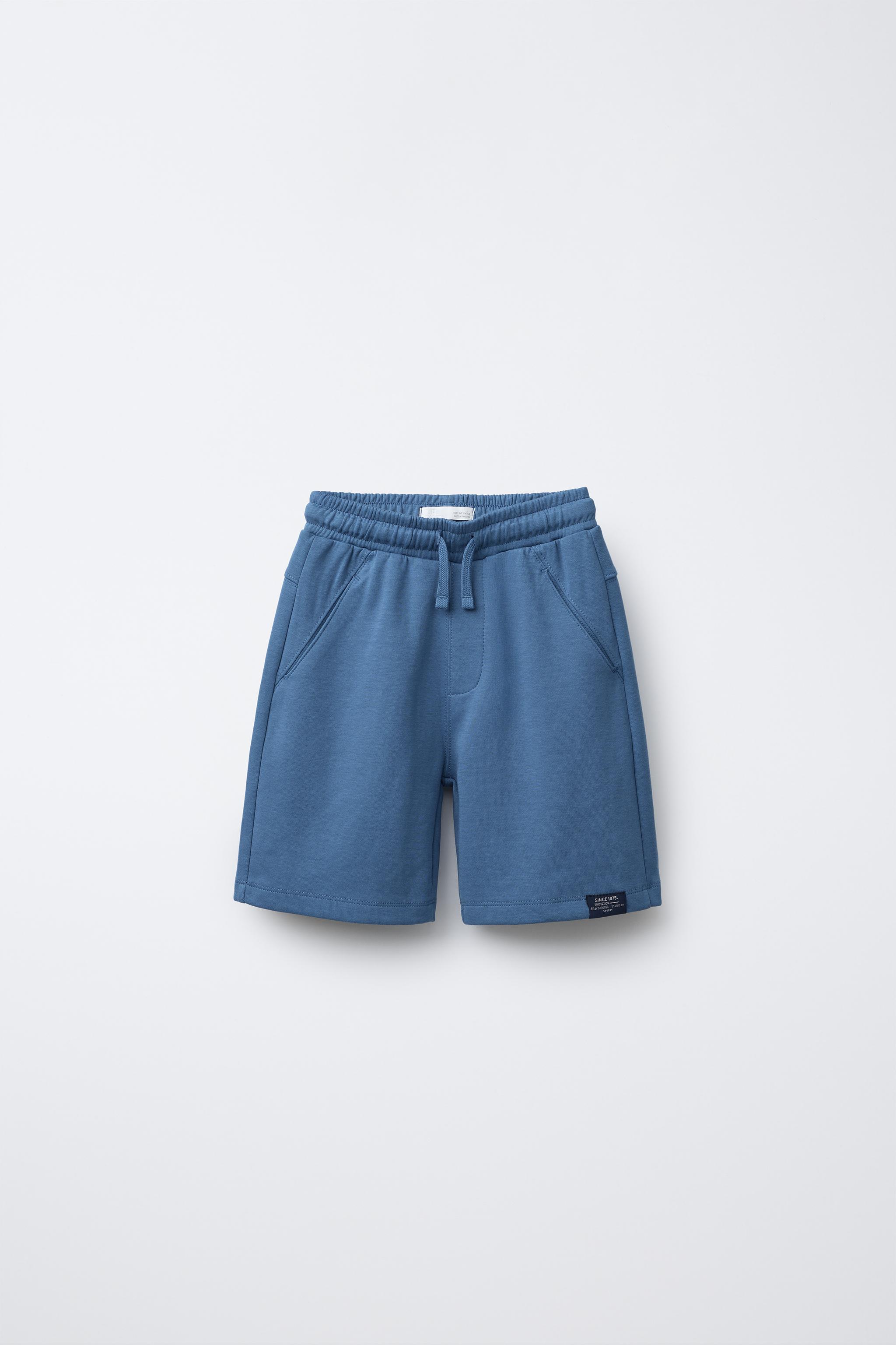 CONJUNTO CAMISETA Y BERMUDA TEXTO - Azul eléctrico | ZARA Chile