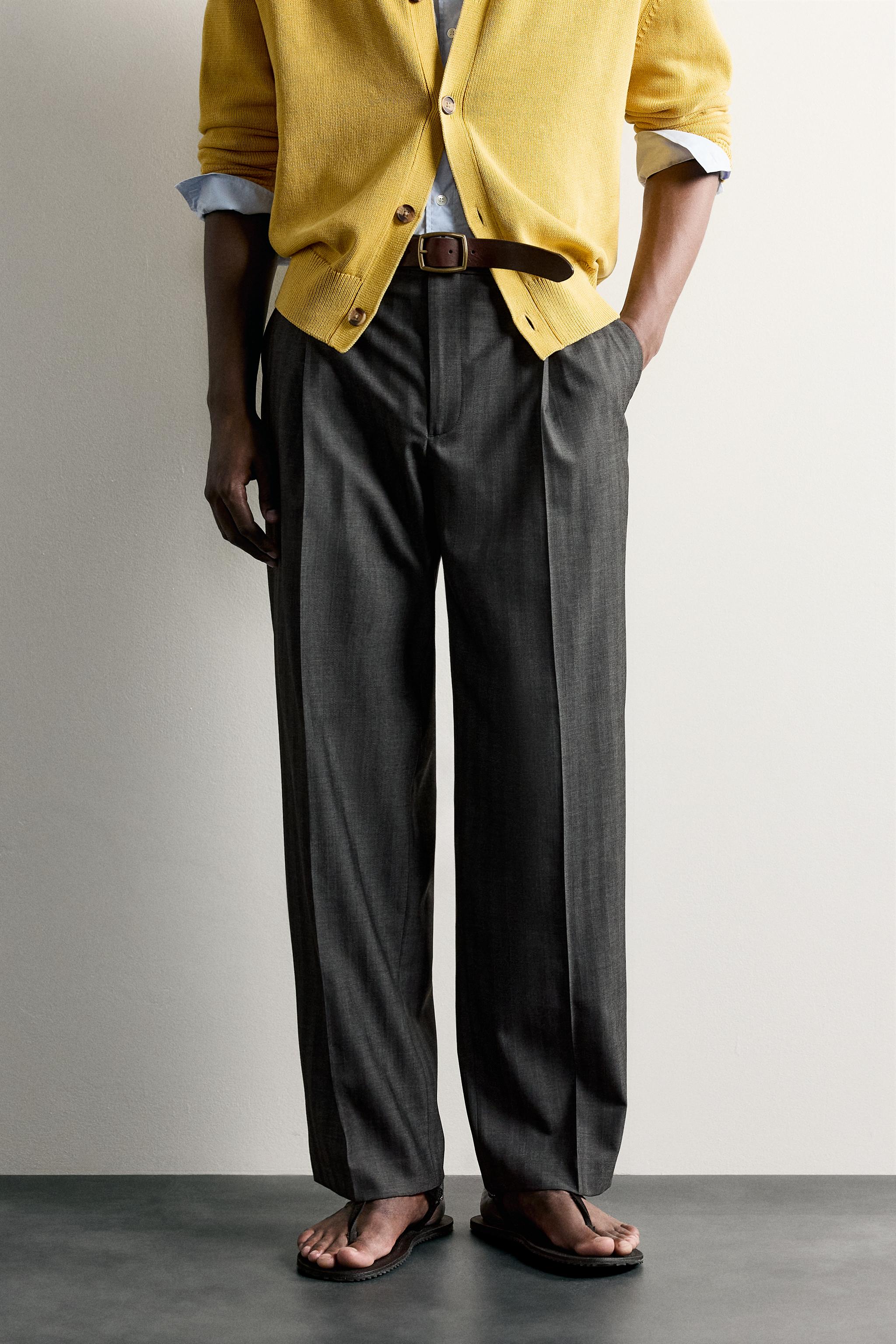 STRIPED PLEATED RELAXED FIT PANTS