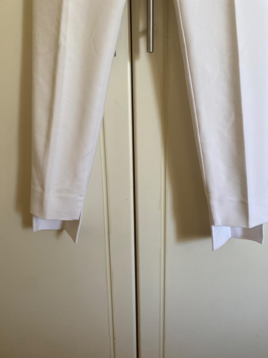 TROUSERS WITH ASYMMETRIC HEMS - Image 2