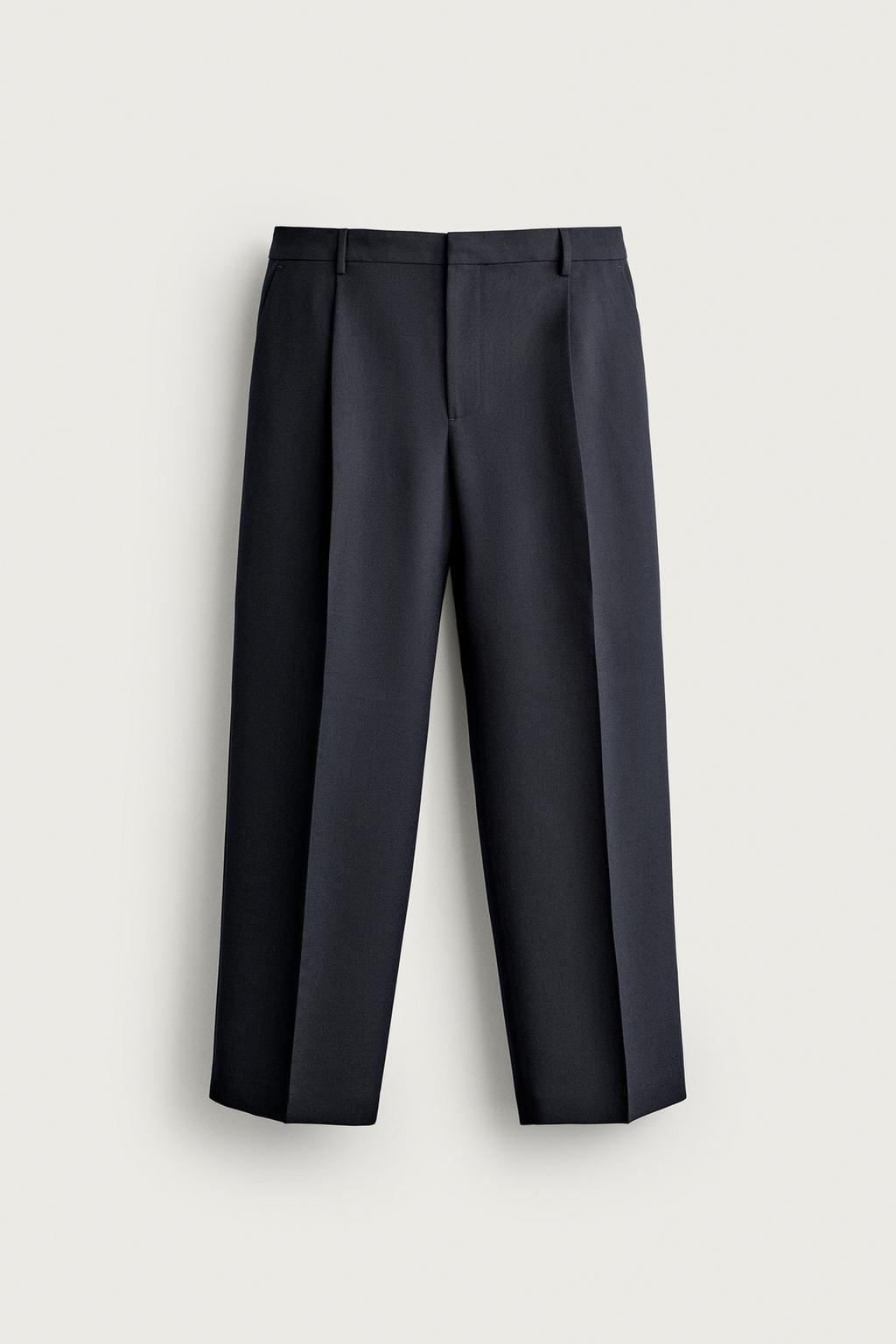 RELAXED FIT PLEATED TROUSERS