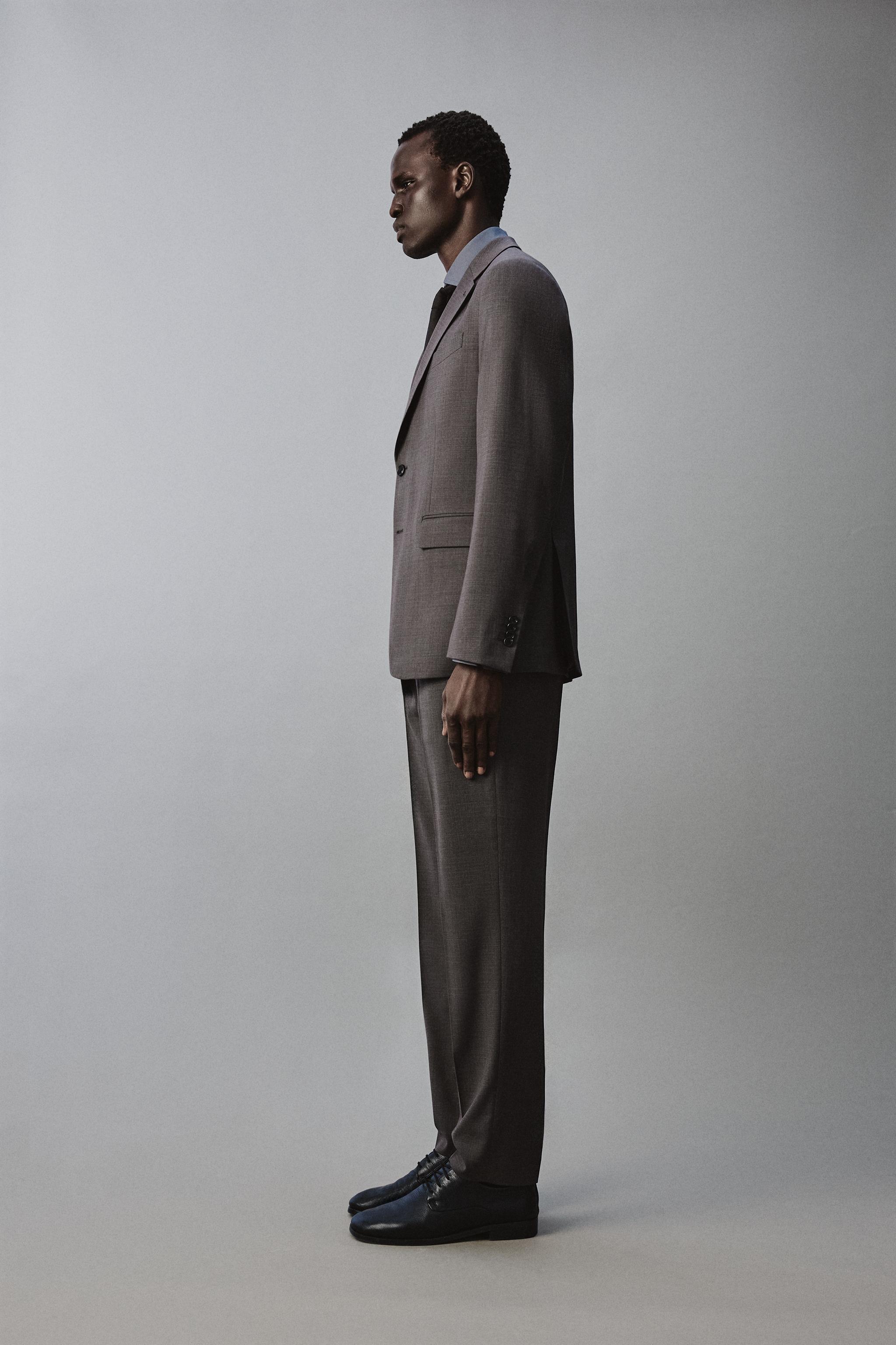 TEXTURED SUIT PANTS