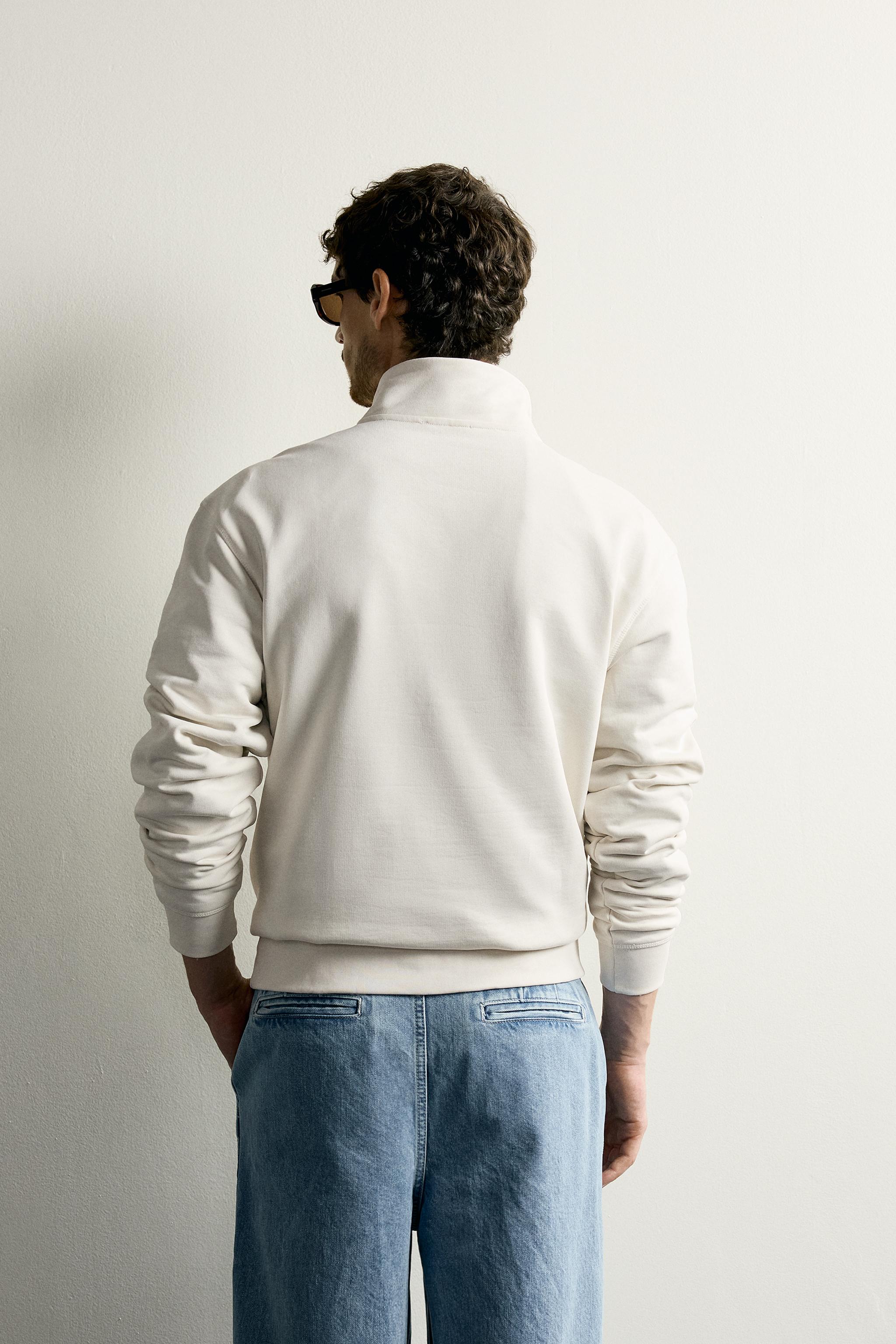 SWEAT BASIQUE À COL ZIPPÉ