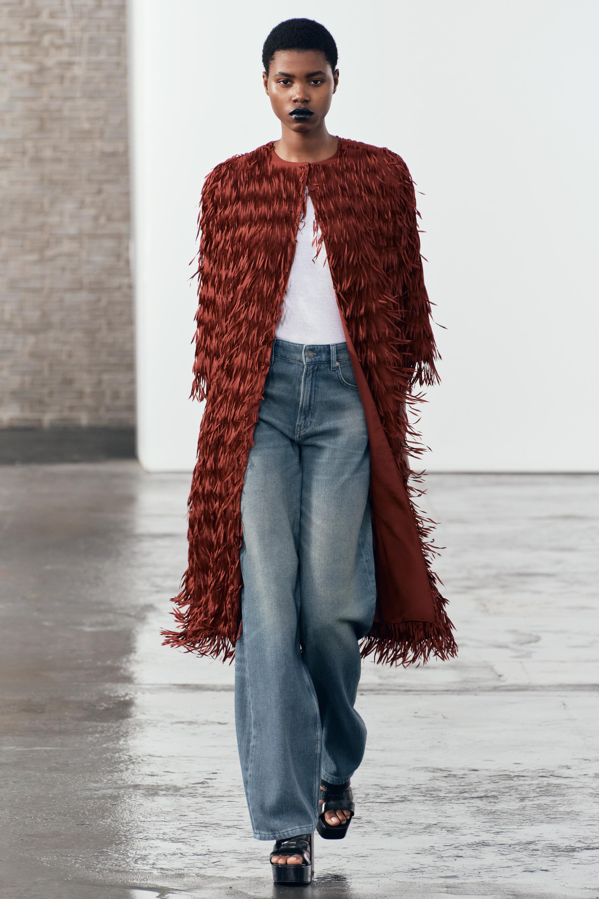 FRINGED COAT