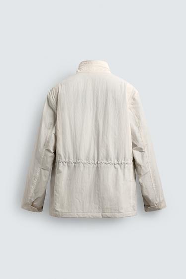 BLOUSON TECHNIQUE MATELASSÉ AVEC POCHES - Beige clair de Zara - Image 9