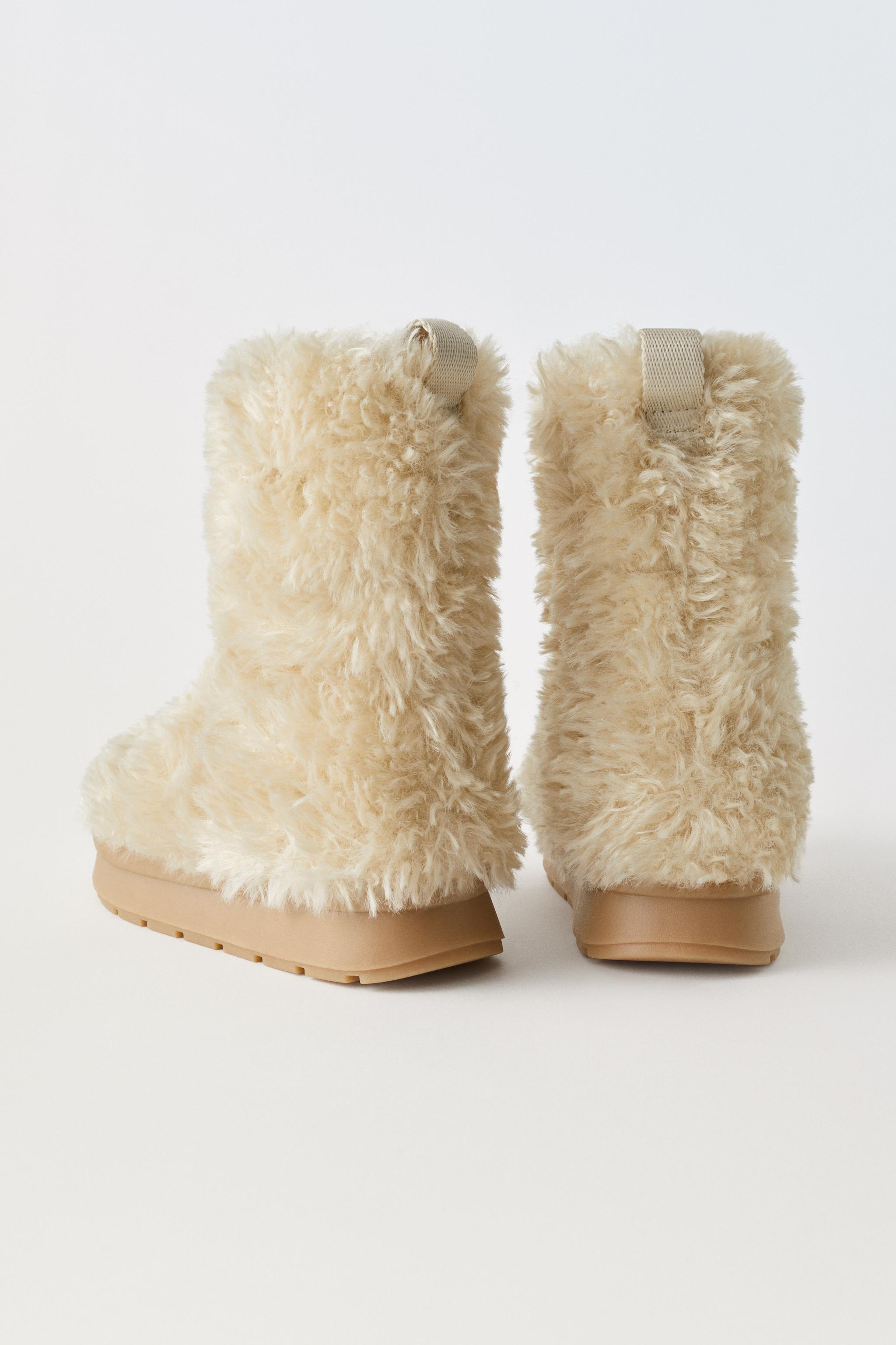 Saint laurent outlet fur boots