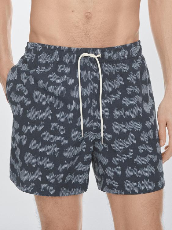 Printed swimming trunks from Zara - $90
