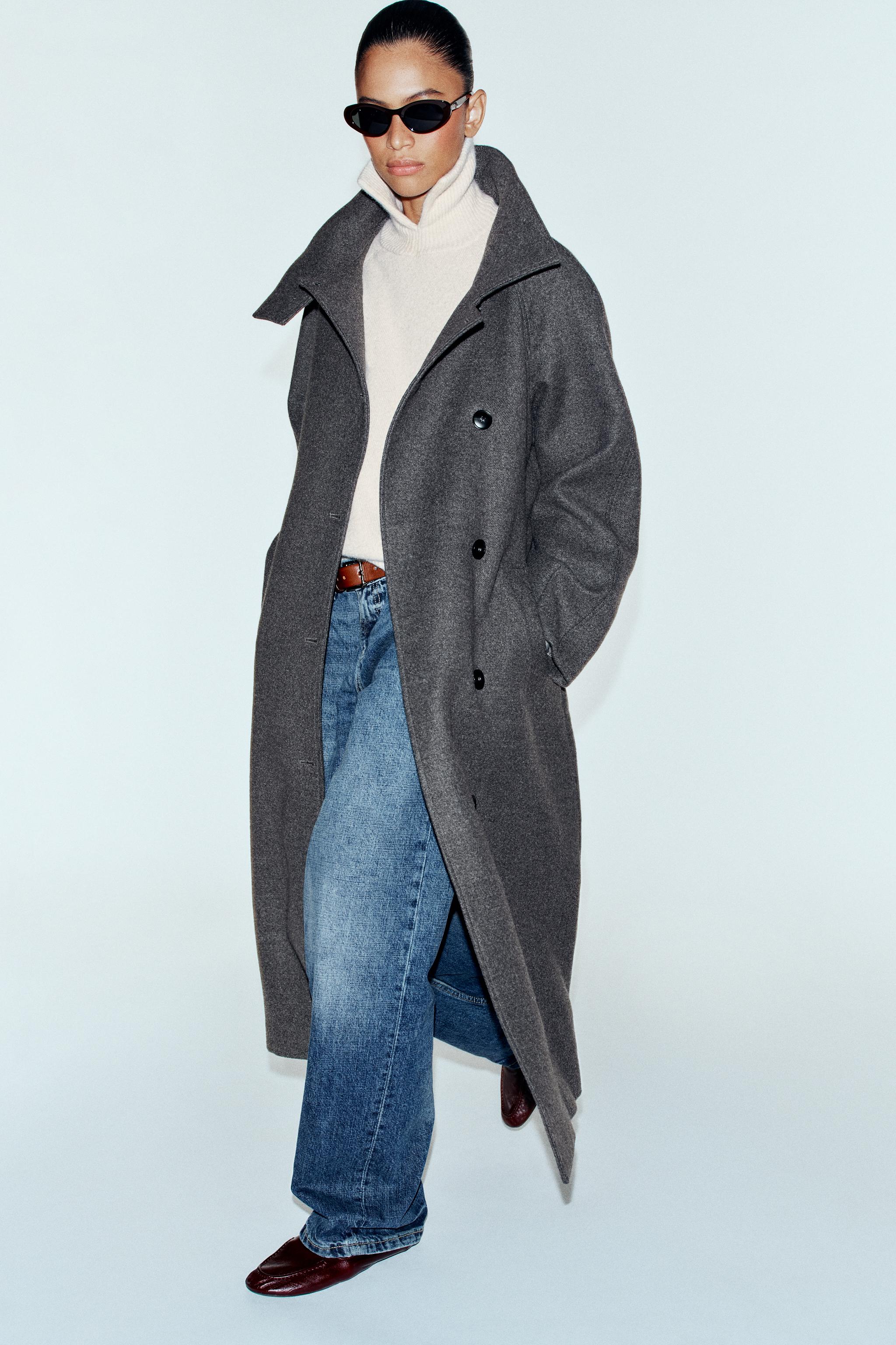 Manteau à col montant avec ceinture