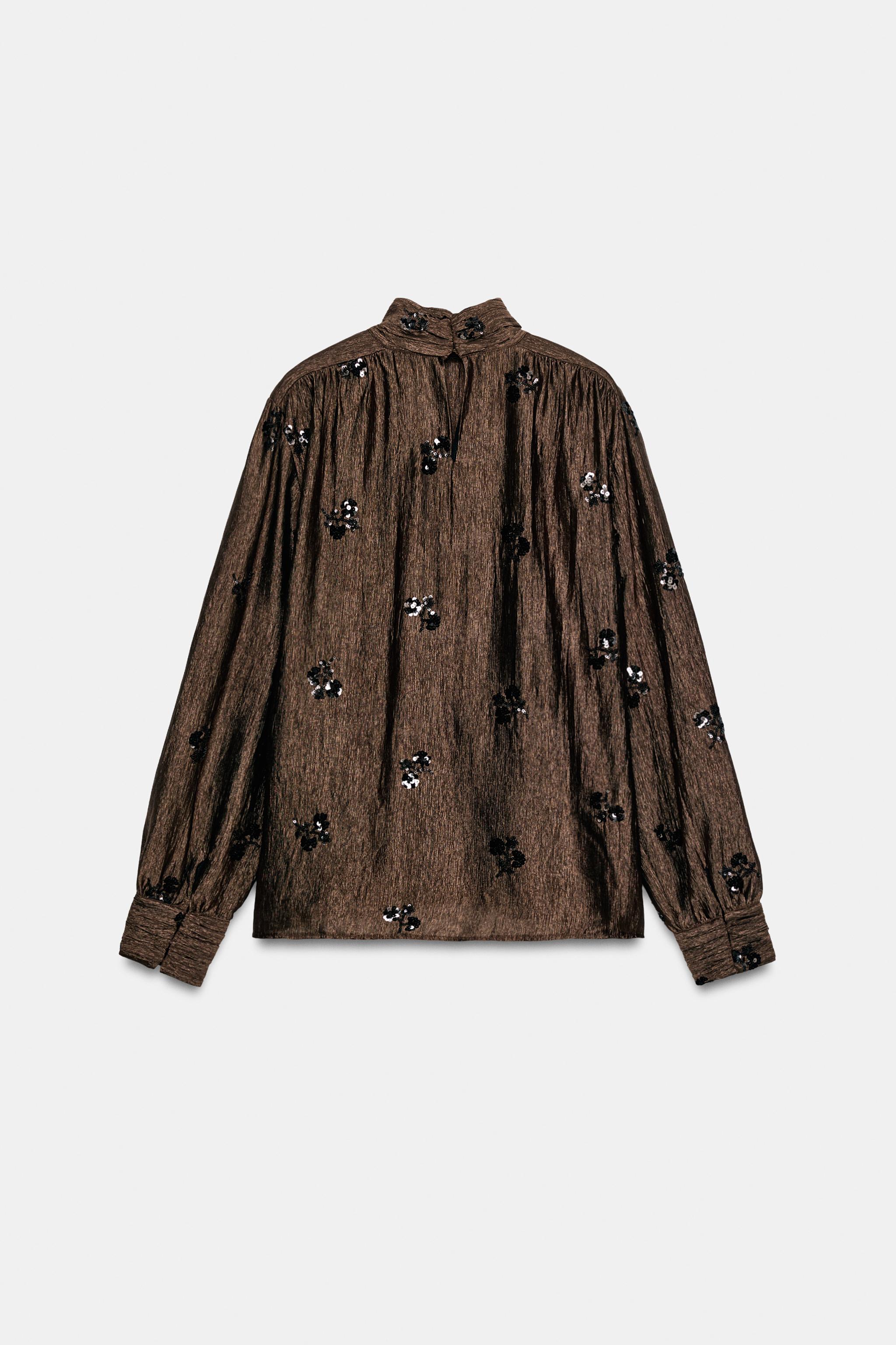 BLOUSE À FLEURS ET PAILLETTES