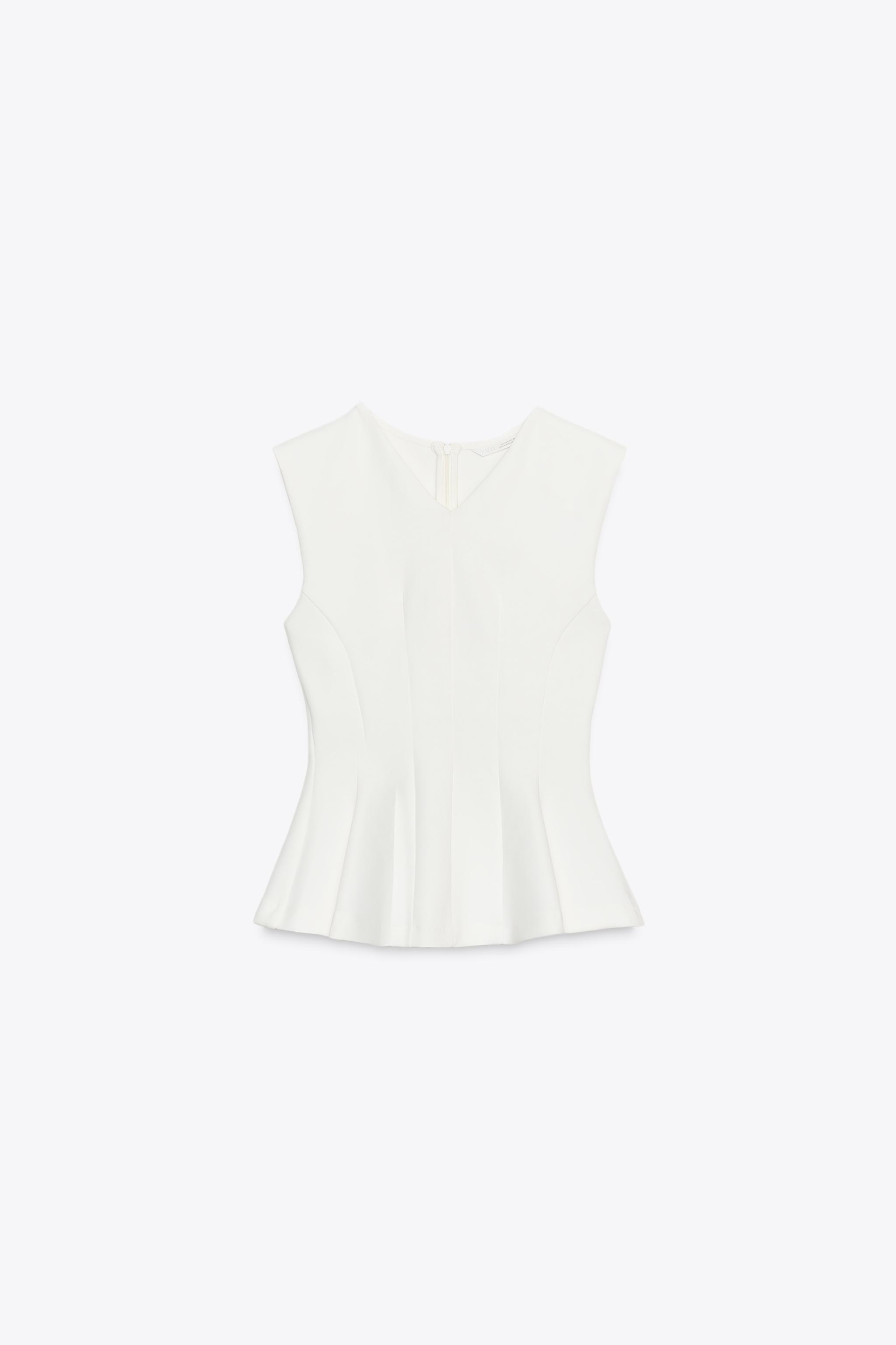 TOP INTERLOCK PÉPLUM SANS MANCHES