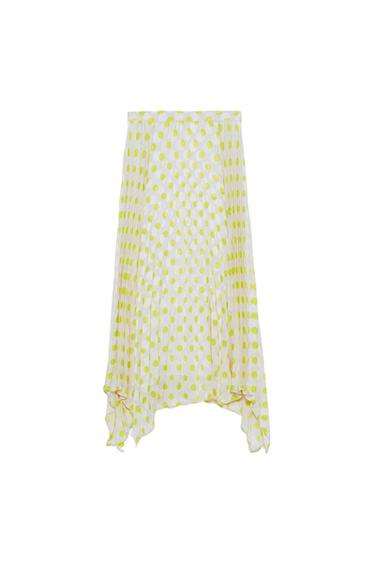 White skirt with yellow polka dots and an asymmetric design.