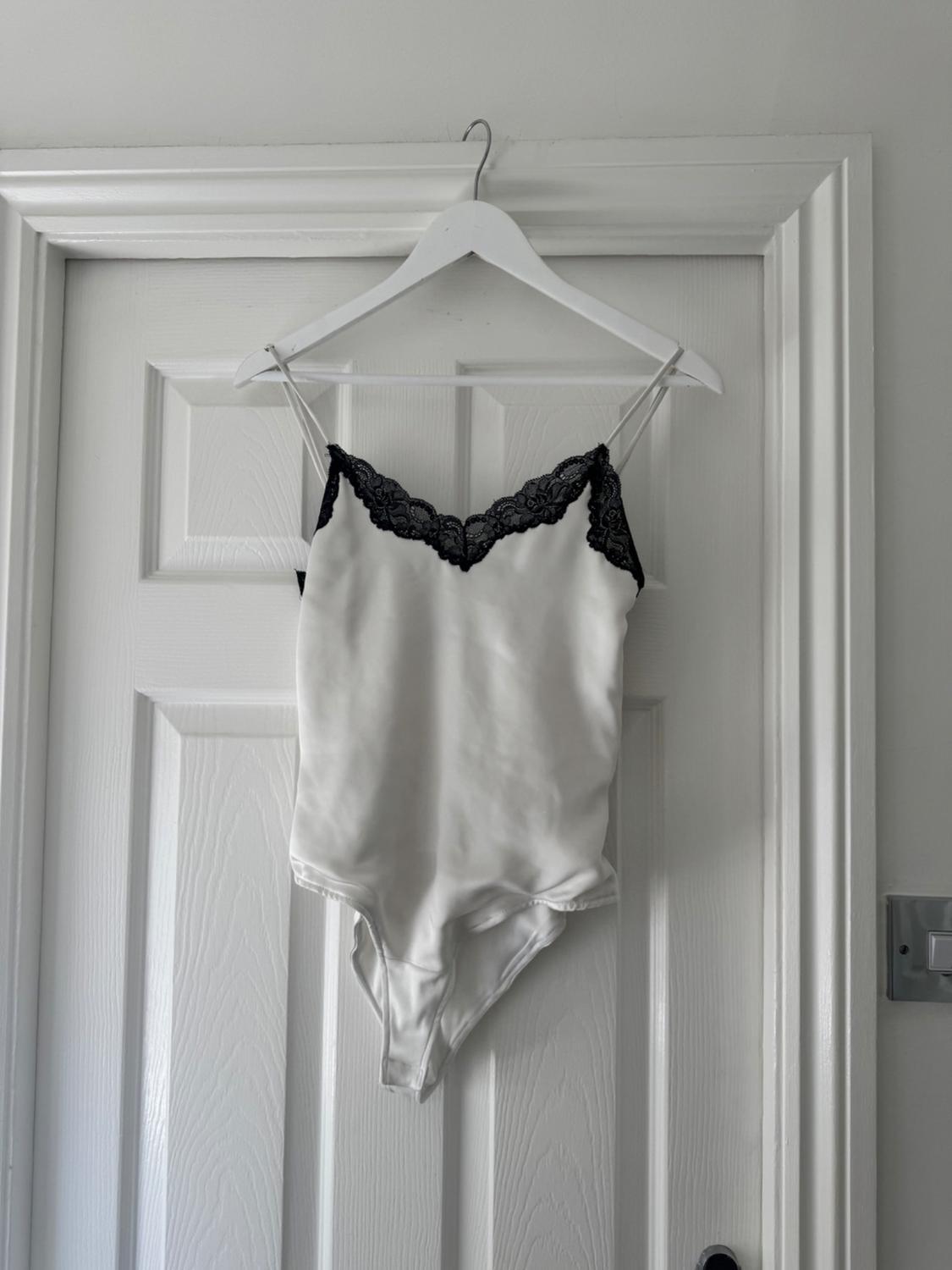 SATIN BODYSUIT WITH LACE APPLIQUÉ