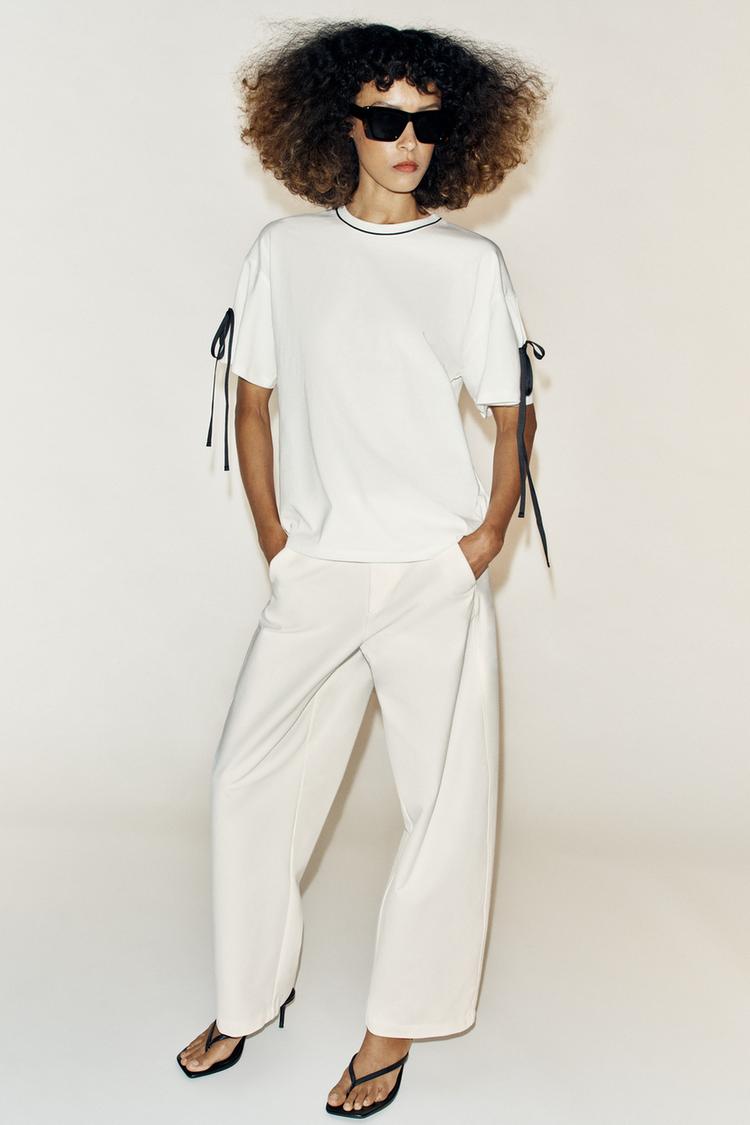 T-SHIRT WITH CONTRAST PIPING AND TIES