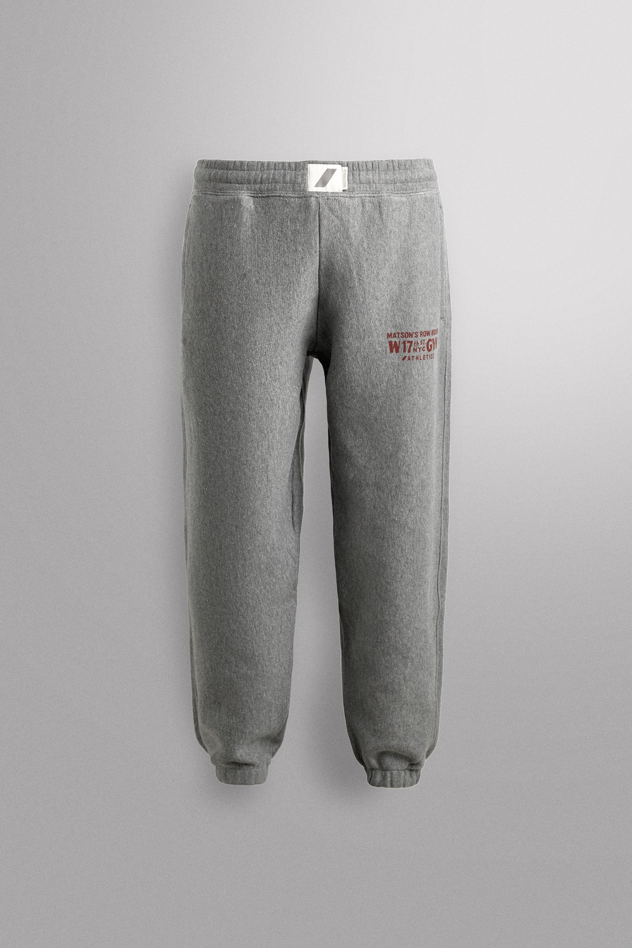 JOGGING PANTS WITH PRINTED TEXT