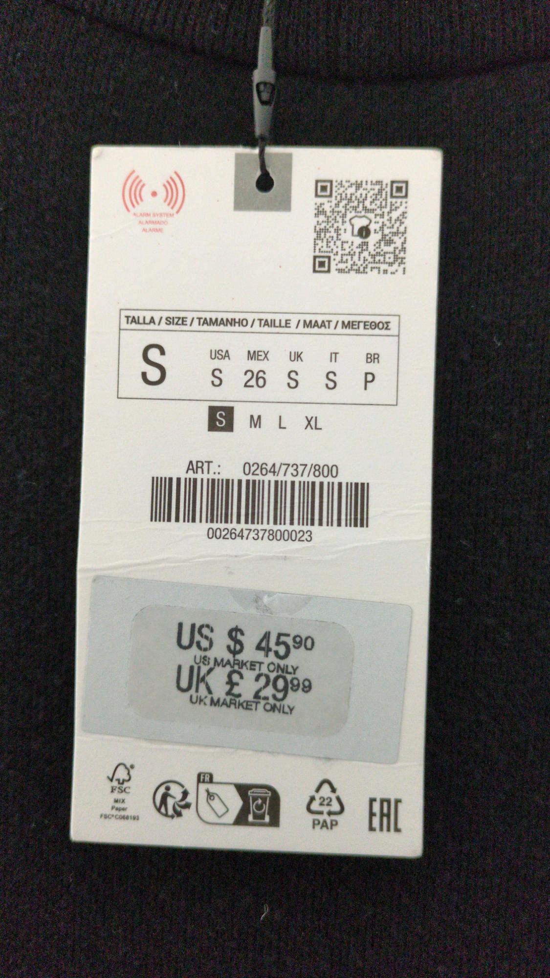White label on a black garment with the text: SIZE S, ITEM: 0264/737/800, US $45.90 US MARKET ONLY, UK £29.99 UK MARKET ONLY.