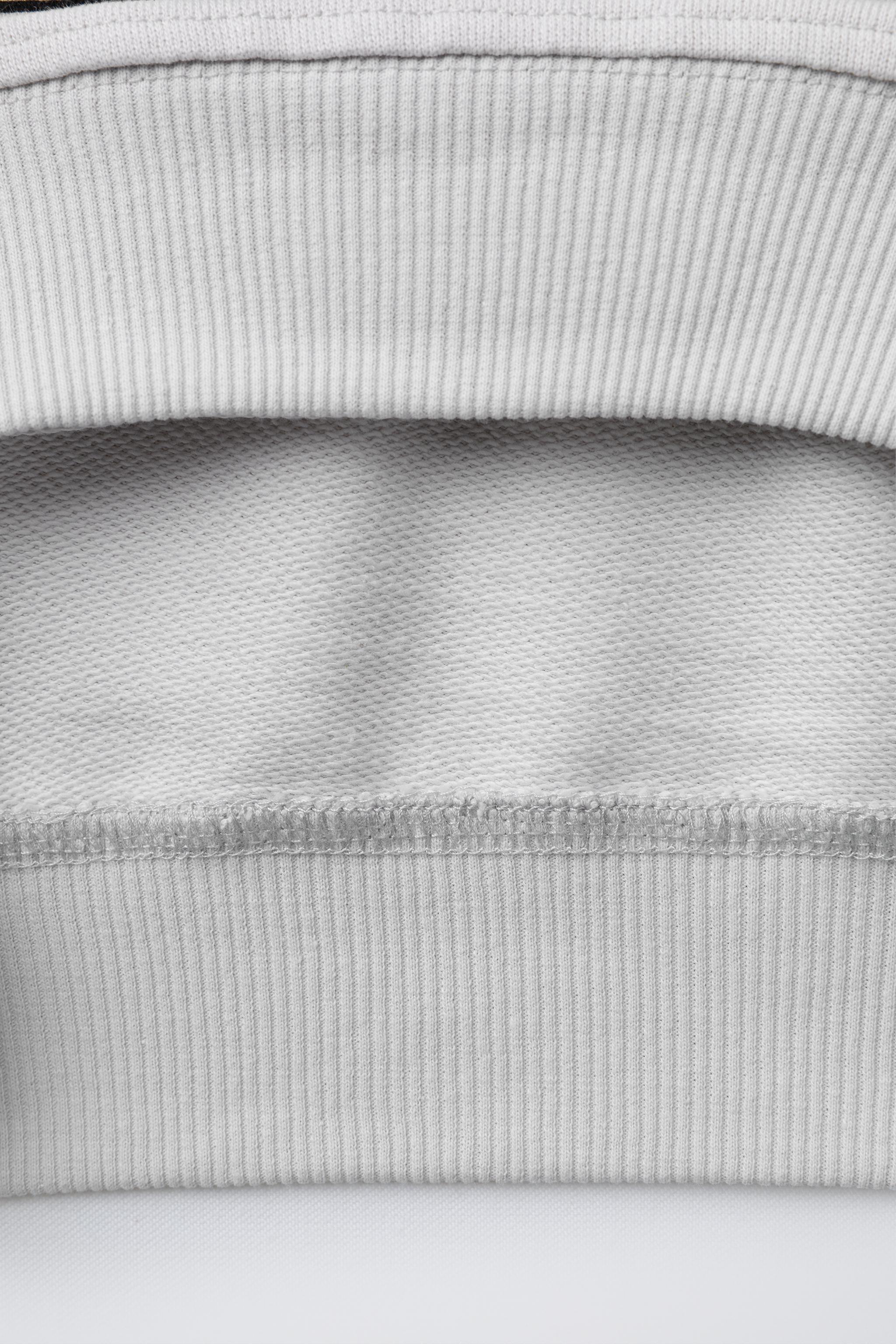 SWEAT À CAPUCHE ET MANCHES COURTES