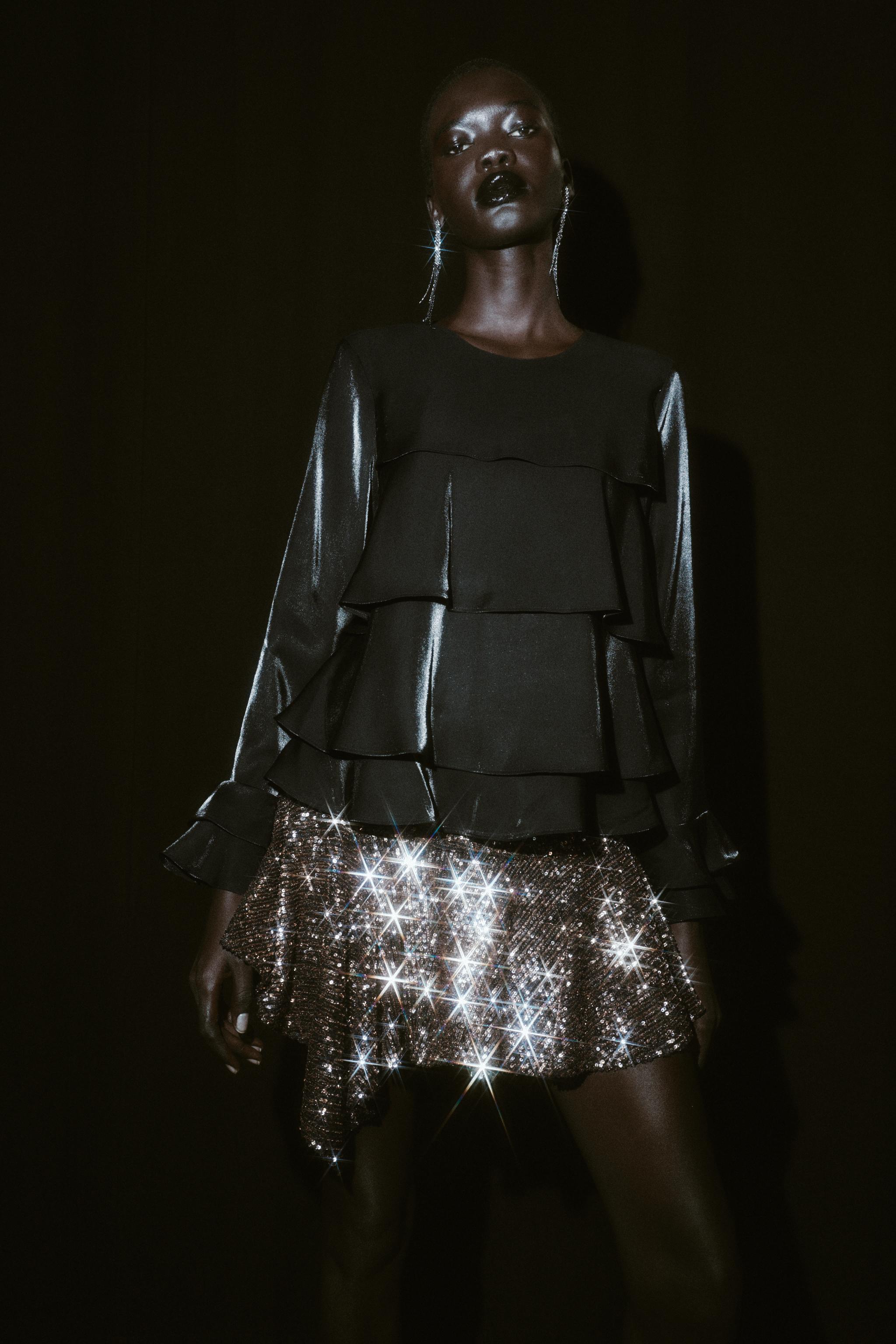 ASYMMETRIC SEQUIN SKORT