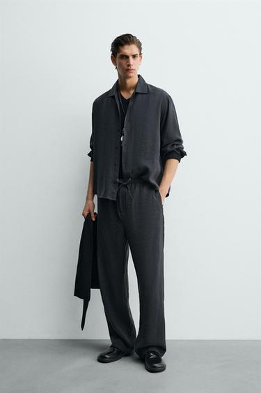 FLOWING RELAXED FIT TROUSERS - Black by Zara