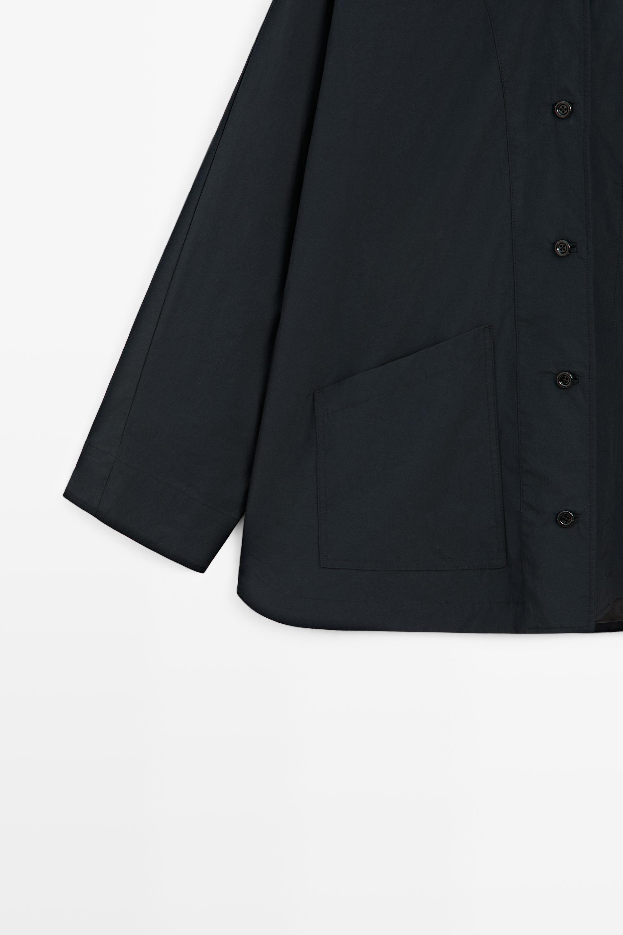 Veste-cape col patte boutonnée