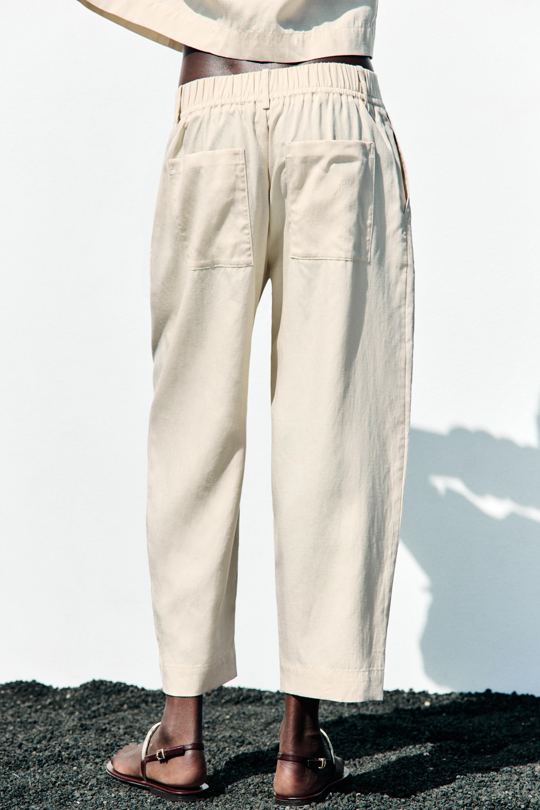 PANTALON À PINCES ET TAILLE ÉLASTIQUE