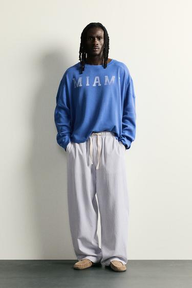PANTALÓN WIDE FIT RAYAS - rayas de Zara