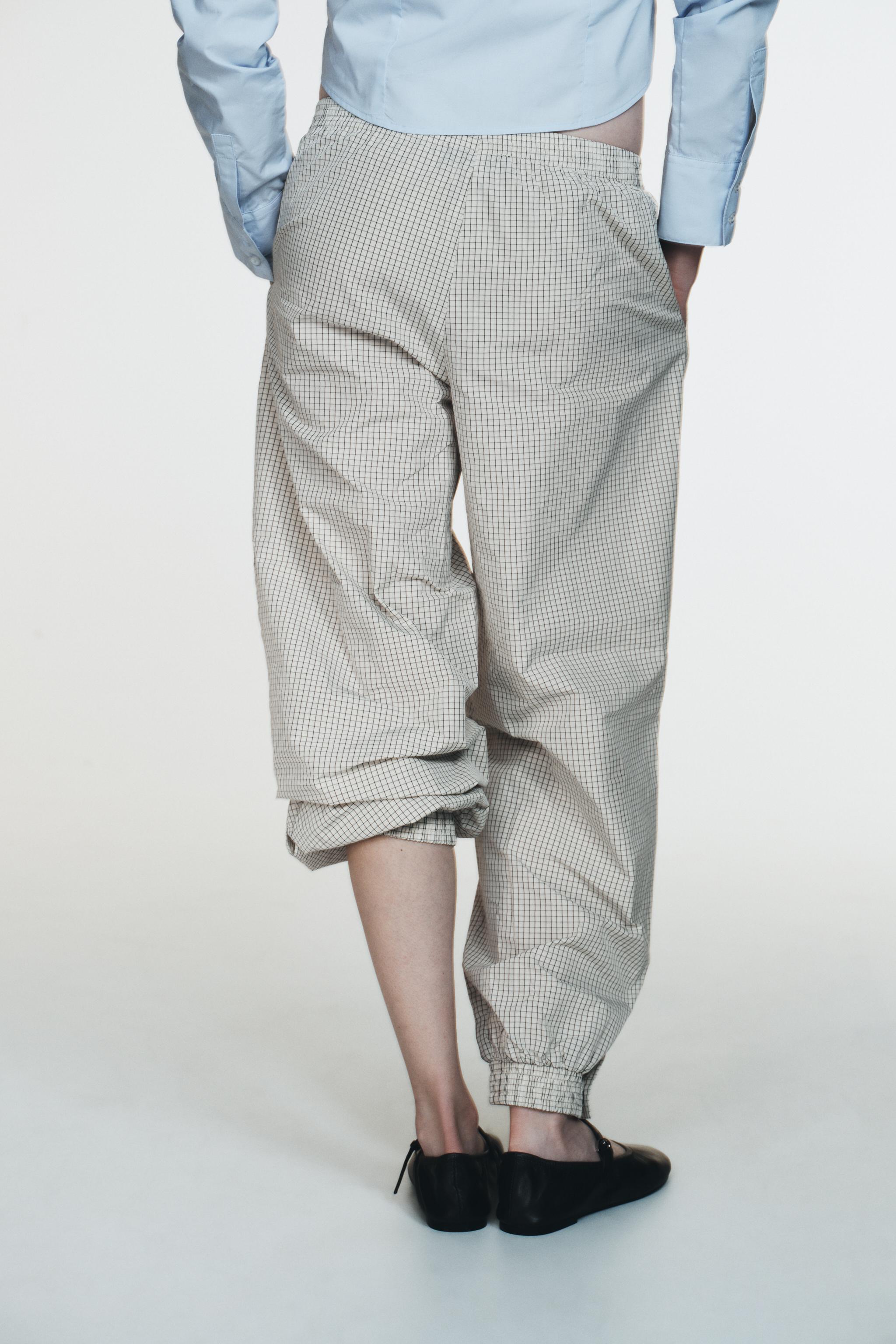 PANTALON BOUFFANT NYLON À CARREAUX