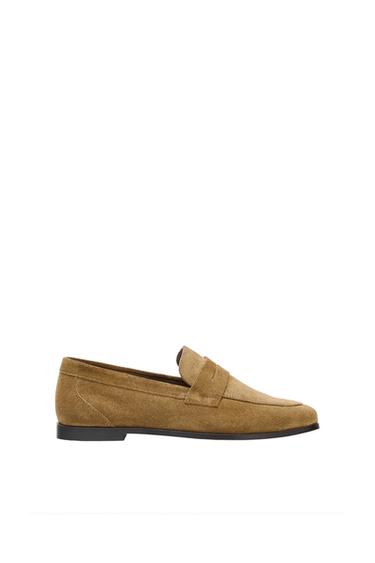 Light brown suede loafer with a dark sole, shown in profile against a clean white background.
