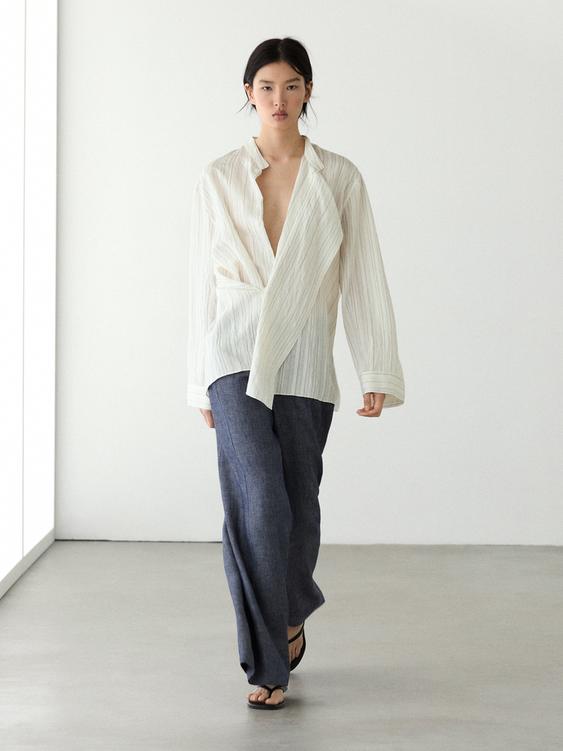 High-waist linen palazzo trousers from Zara - $130