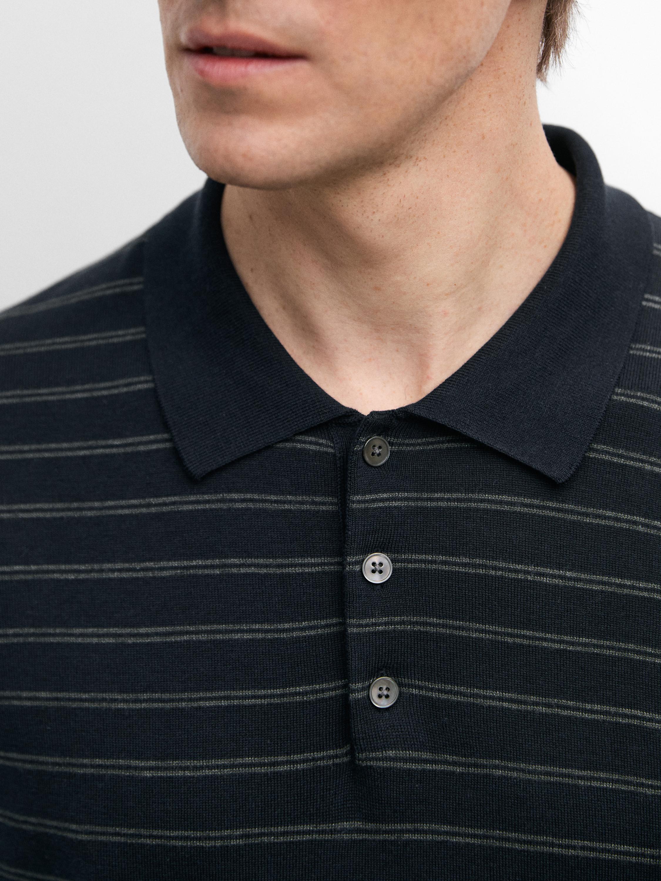 Cotton blend knit polo shirt with striped detail